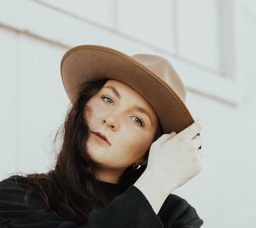 Woman wearing brown hat portrait
